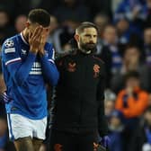 Connor Goldson of Rangers is seen as he leaves the pitch injured 