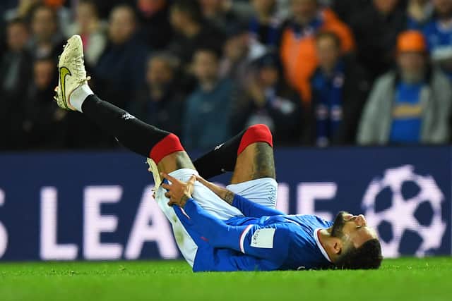 Rangers’ English defender Connor Goldson goes down injured during the UEFA Champions League Group A match