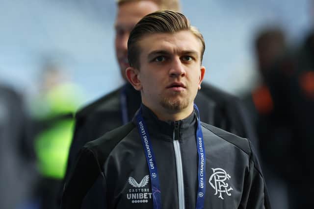 Ridvan Yilmaz of Rangers arrives at the stadium prior to the UEFA Champions League group A match between Rangers and Liverpool