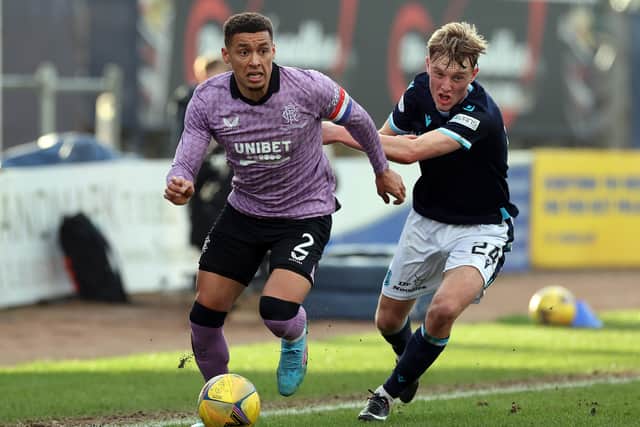 James Tavernier of Rangers vies with Max Anderson of Dundee