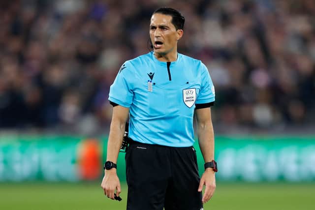 Referee Serdar Gozubuyuk reacts during the UEFA Europa League semi-final first leg football match between West Ham United and Eintracht Frankfurt