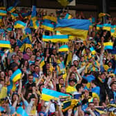 Ukraine fans celebrate after Andriy Yarmolenko (not pictured) scored their sides first goal during the FIFA World Cup Qualifier match against Scotland 