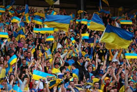 Ukraine fans celebrate after Andriy Yarmolenko (not pictured) scored their sides first goal during the FIFA World Cup Qualifier match against Scotland 