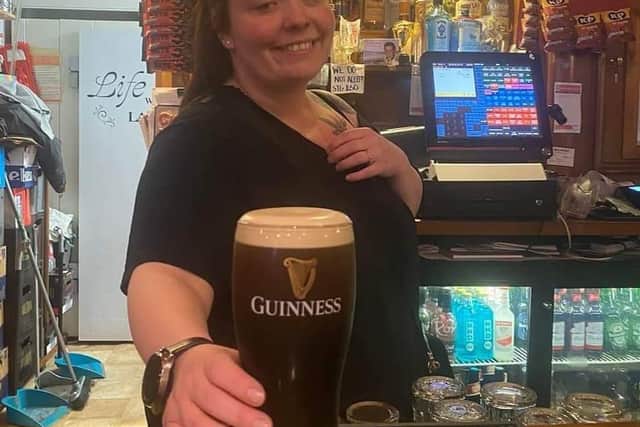 Sarah Love (Girl_Drinks_Guinness on Instagram) after pouring her first pint of Guinness at The Railway Bar in Bundoran, Donegal.