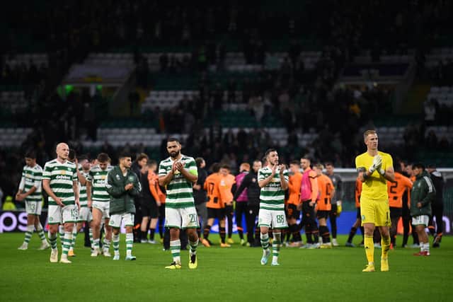 Celtic's team players applaud supporters at the end of the UEFA Champions League Group F football match