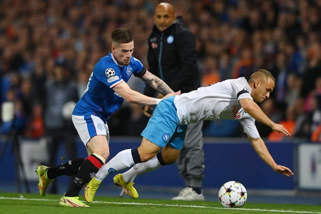 Ryan Kent of Rangers battles for possession with Stanislav Lobotka of SSC Napoli