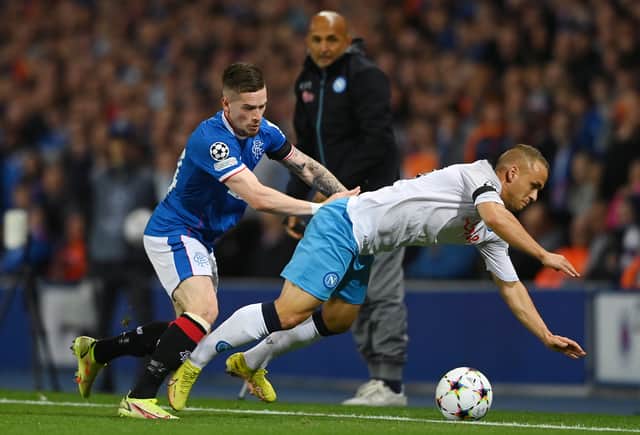 Ryan Kent of Rangers battles for possession with Stanislav Lobotka of SSC Napoli