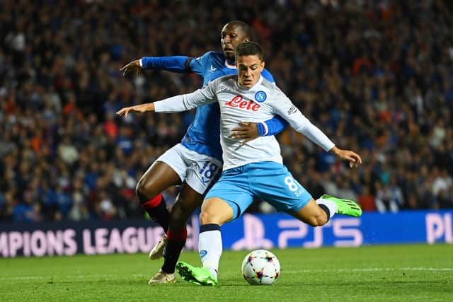 Giacomo Raspadori of SSC Napoli scores their side's second goal whilst under pressure from Glen Kamara of Rangers