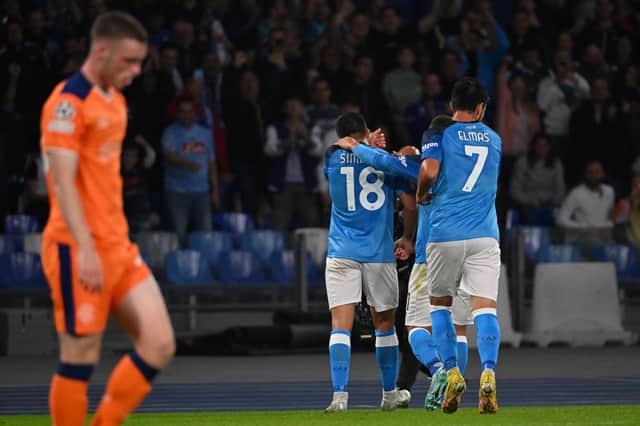 Napoli's players celebrate after scoring the opening goal 