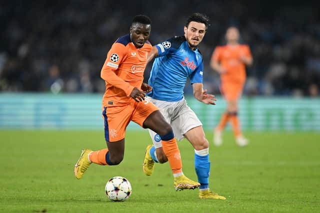 Fashion Sakala of Rangers is challenged by Eljif Elmas of Napoli 