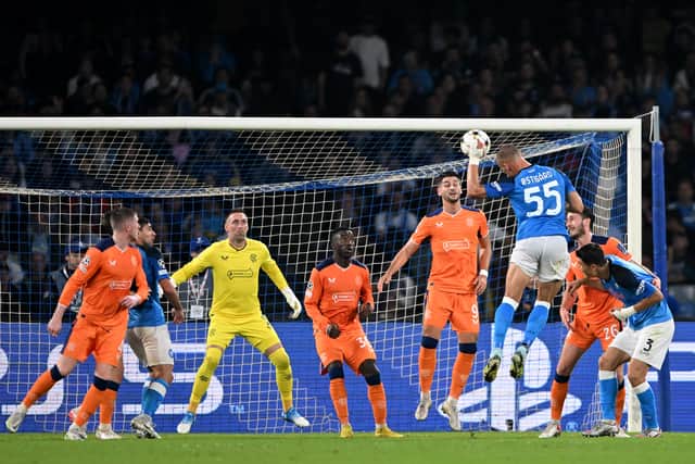 Leo Ostigard of Napoli scores their side's third goal 