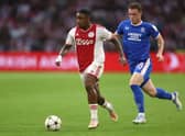 Steven Bergwijn of Ajax runs with the ball while under pressure from Leon King of Rangers during the UEFA Champions League group A match at Johan Cruyff Arena on September 07, 2022 in Amsterdam, Netherlands.