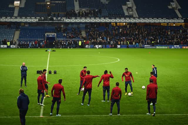 Ajax players attend an open team training session at Ibrox Stadium last night