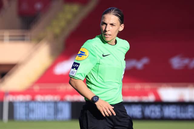 French referee Stephanie Frappart looks on during the French L1 football match between AS Monaco and SCO Angers at the Louis II Stadium in Monaco on October 30, 2022