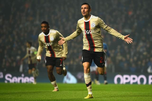 Ajax's Dutch forward Steven Berghuis celebrates scoring his team's first goal 