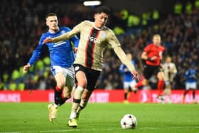 Rangers’ English winger Ryan Kent (L) vies with Ajax’s Mexican defender Edson Alvarez (R) 
