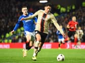 Rangers’ English winger Ryan Kent (L) vies with Ajax’s Mexican defender Edson Alvarez (R) 
