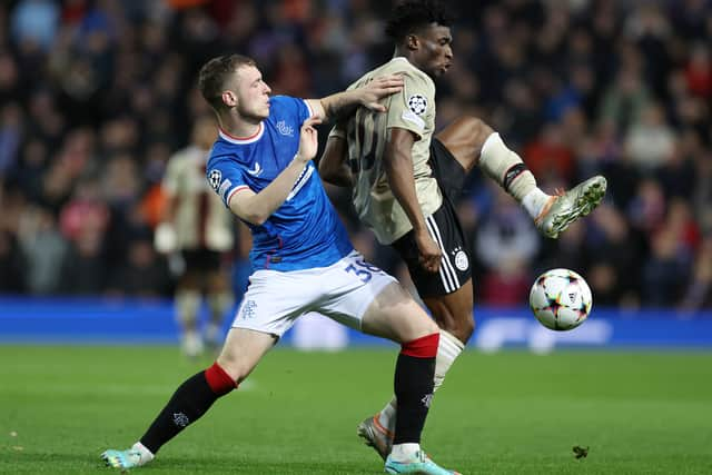  Leon King of Rangers challenges Mohammed Kudus of AFC Ajax