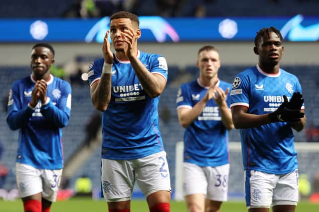 Rangers captain James Tavernier applauds the fans at full-time