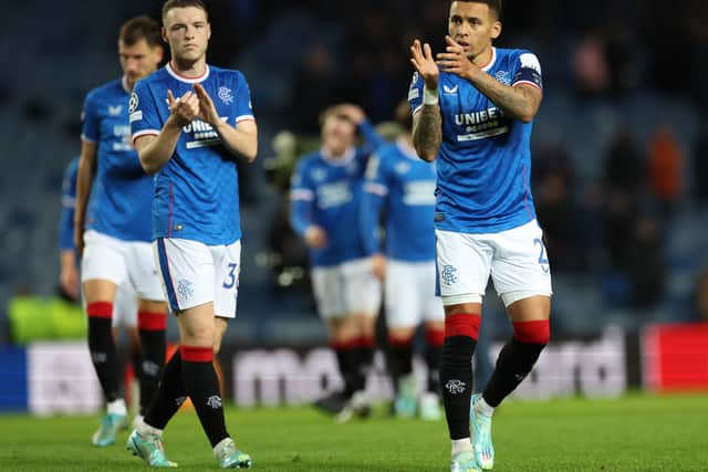 Rangers captain James Tavernier applauds the fans