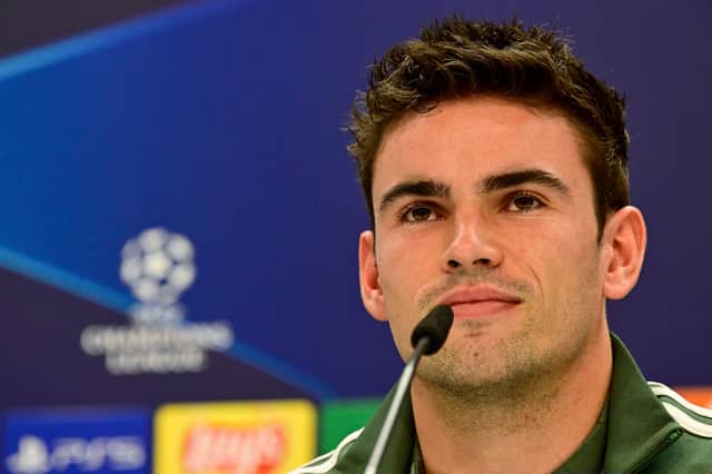 Celtic's English midfielder Matt O'Riley addresses a press conference