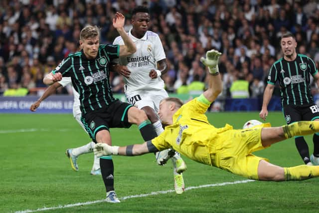 Vinicius Junior of Real Madrid scores their sides fourth goal 