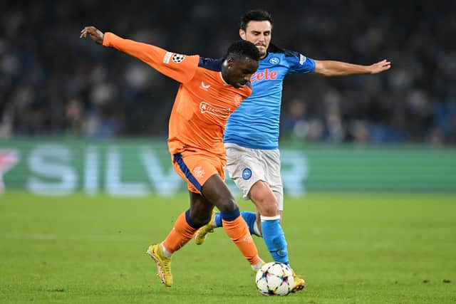 ashion Sakala is challenged by Eljif Elmas during the UEFA Champions League group A match between SSC Napoli and Rangers FC at Stadio Diego Armando Maradona