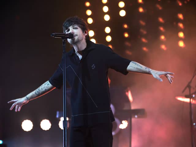 One Direction singer Louis Tomlinson reschedules in-store signing after breaking arm