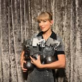 Taylor Swift is seen backstage with the Best Artist, Best Video, Best Pop and Best Longform Video Awards during the Best MTV Europe Music Awards 2022