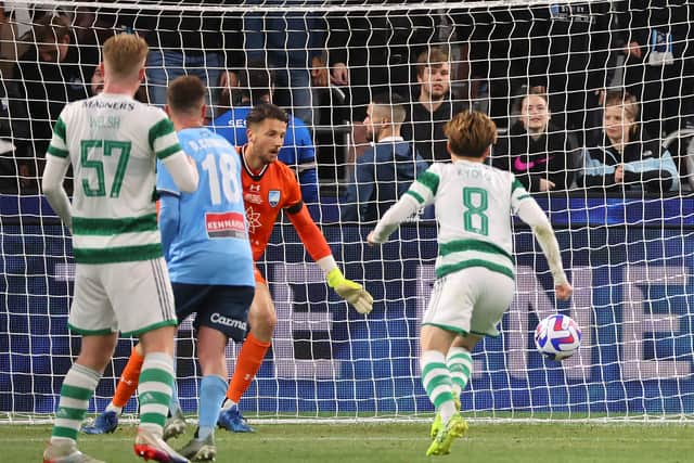 Celtic’s Kyogo Furuhashi (R) scores a goal to equalise against Sydney FC