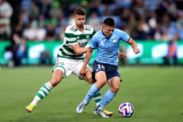 oseph Lolley of Sydney competes with Oliver Abildgaard