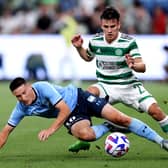 Joseph Lolley of Sydney competes with Alexandro Bernabei of Celtic