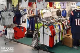 Four tonnes of fake football shirts have been seized by cops during raids ahead of the World Cup - worth a whopping £500,000. Cops raided lock ups and houses across the country in a crackdown on counterfeit goods, which they said are linked to organised criminal groups.