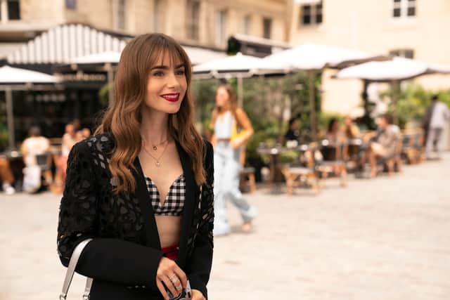 Lily Collins as Emily in Emily in Paris Season 3 (Credit: STÃPHANIE BRANCHU/NETFLIX)