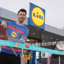 Sean Batty cutting the ribbon at the new Lidl in Airdrie.