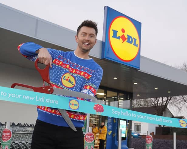 Sean Batty cutting the ribbon at the new Lidl in Airdrie.