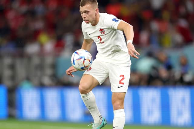 Alistair Johnston of Canada controls the ball during the FIFA World Cup Qatar 2022 Group F match against Belgium