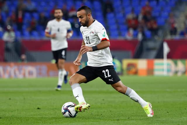 Egypt’s midfielder Mohamed Magdy runs with the ball in a match against Sudan