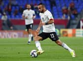 Egypt’s midfielder Mohamed Magdy runs with the ball in a match against Sudan