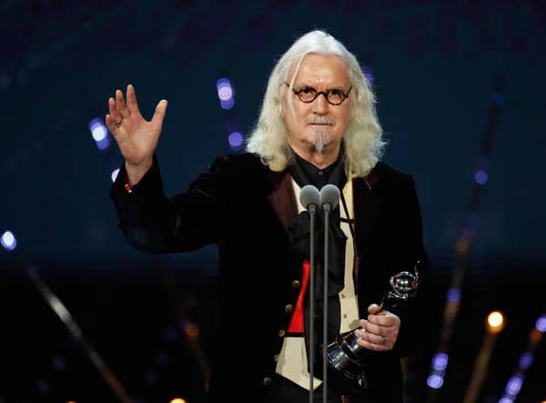 Billy Connolly speaks onstage at the 21st National Television Awards (Credit: Tristan Fewings/Getty Images)