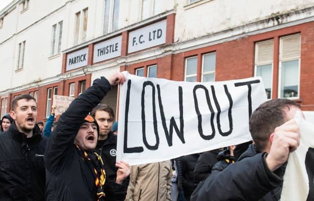 <p>A group of Partick Thistle supporters protested against the club board and PTFC Trust before, and during, their Scottish Cup tie against Kelty Hearts (Image - SNS Group)</p>