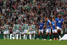 David Turnbull celebrates with teammates after scoring their team’s fourth goal during the Cinch Scottish Premiership match between Celtic FC and Rangers FC at Celtic Park Stadium on September 03, 2022 in Glasgow, Scotland