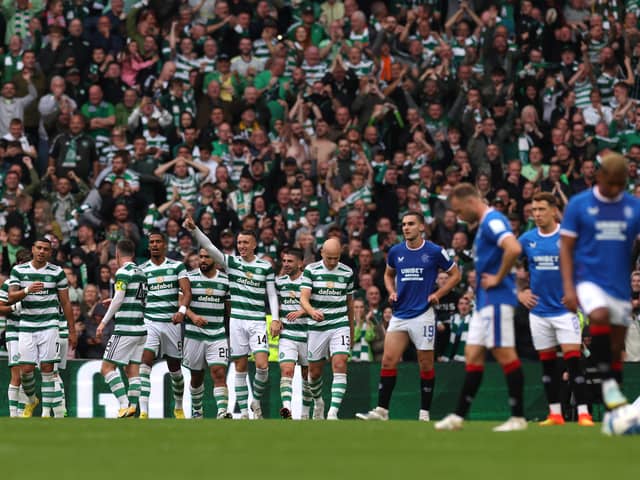 David Turnbull celebrates with teammates after scoring their team’s fourth goal during the Cinch Scottish Premiership match between Celtic FC and Rangers FC at Celtic Park Stadium on September 03, 2022 in Glasgow, Scotland