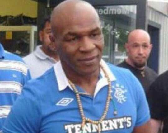 Mike Tyson was papped wearing a Rangers top while training in England.