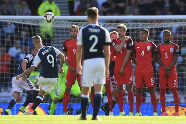 Leigh Griffiths of Scotland scores his sides first goal from a freekick during the FIFA 2018 World Cup Qualifier against England