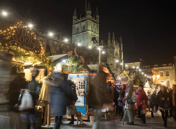 Christmas shoppers browse stalls at the traditional Christmas market in Bath.
