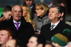 Dermot Desmond (L) and chairman of Celtic Peter Lawwell look on at Celtic Park