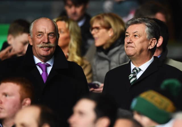 Dermot Desmond (L) and Chief Executive of Celtic Peter Lawwell look on at Celtic Park