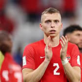  Alistair Johnston and Canada players applaud fans after their 1-2 defeat in the FIFA World Cup Qatar 2022 Group F match against Morocco 