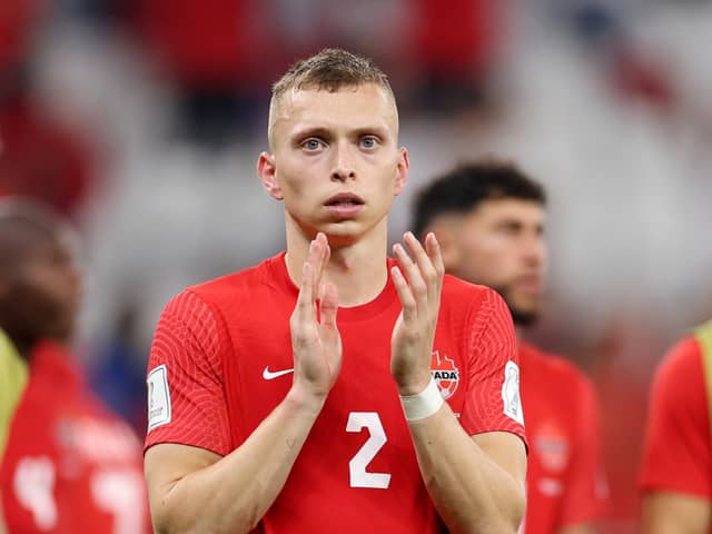  Alistair Johnston and Canada players applaud fans after their 1-2 defeat in the FIFA World Cup Qatar 2022 Group F match against Morocco 